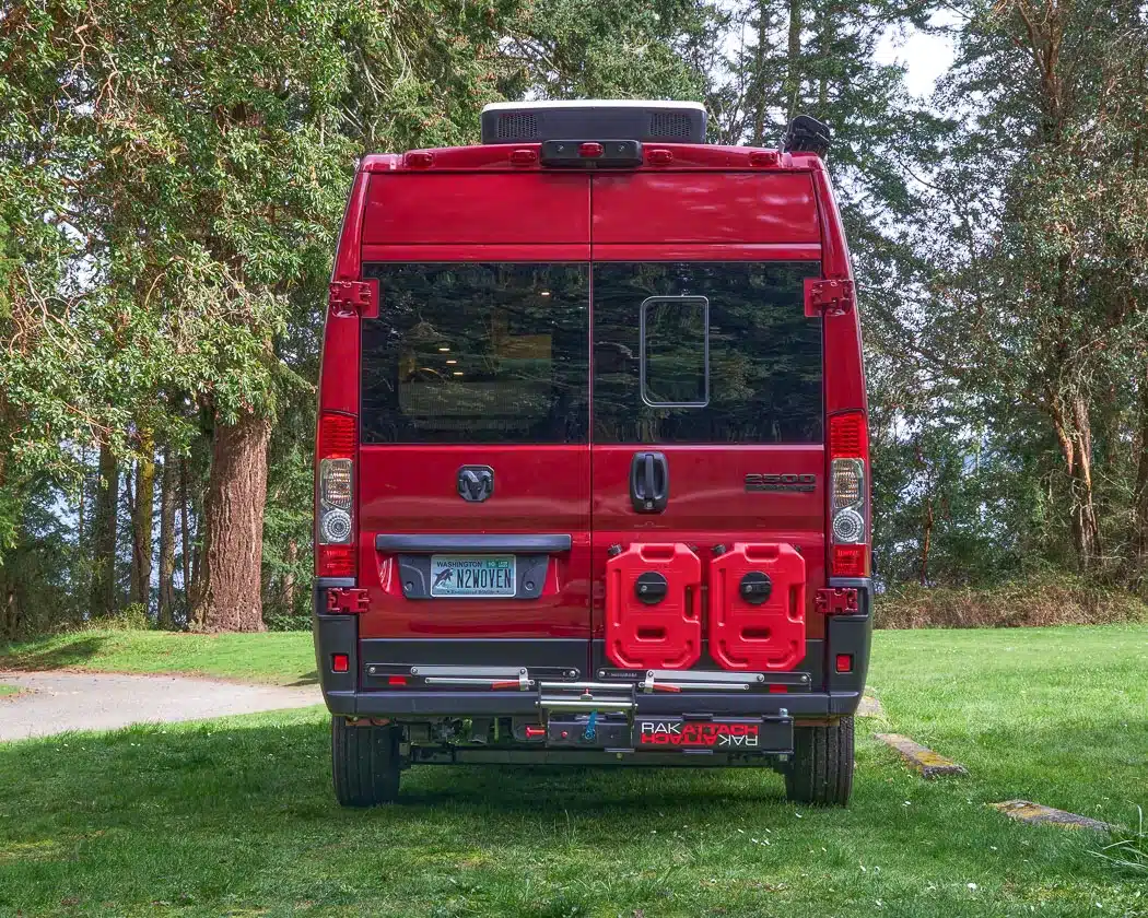 Beautiful interior of a professionally converted off-grid ready RAM ProMaster van from the team of Camp N Car located in Port Townsend on Washington's Olympic Peninsula van rear