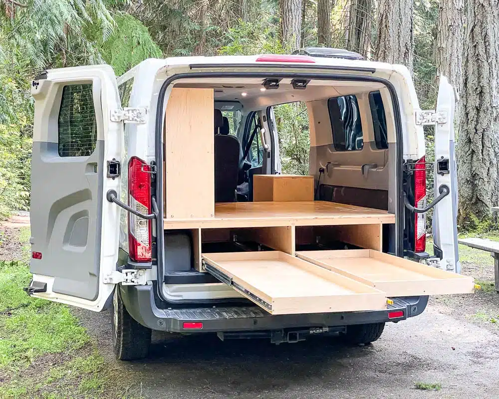 A fantastic low roof Ford Transit campervan with a functional and utilitarian build completed by the talented custom conversion shop at Camp N Car in Port Townsend Washington on the Olympic Peninsula