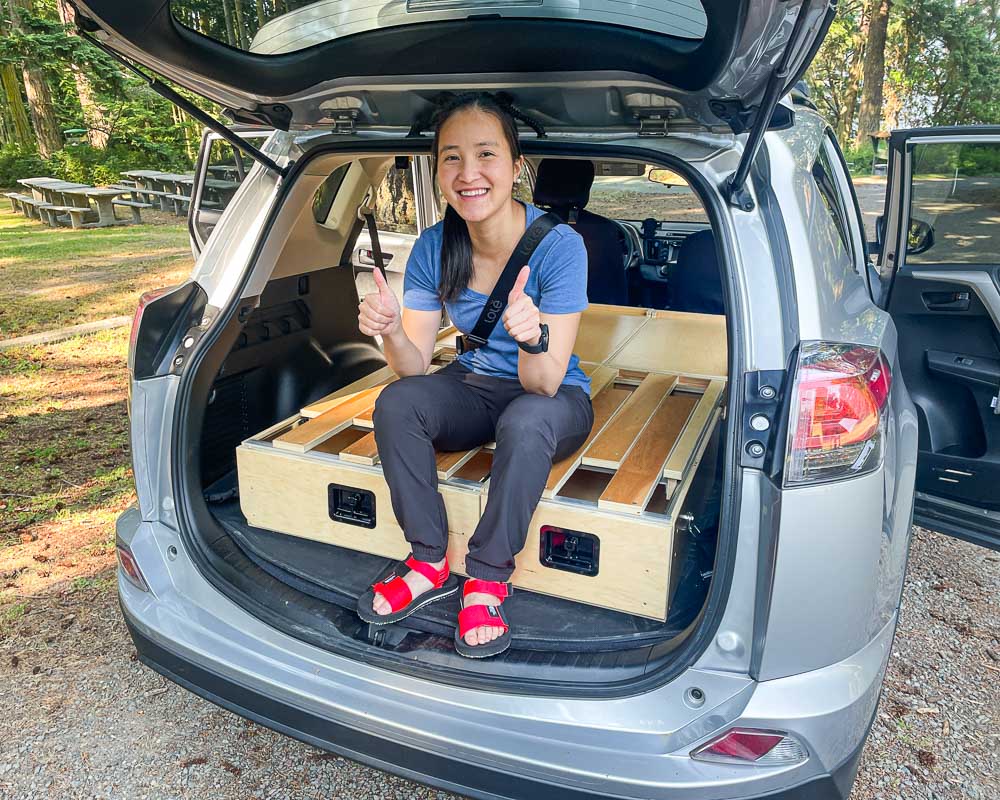 Amazing camper build for comfortable sleeping in a 2017 Toyota RAV4 that stows away in the rear cargo area made by the conversion shop of Camp N Car in Port Townsend Washington.