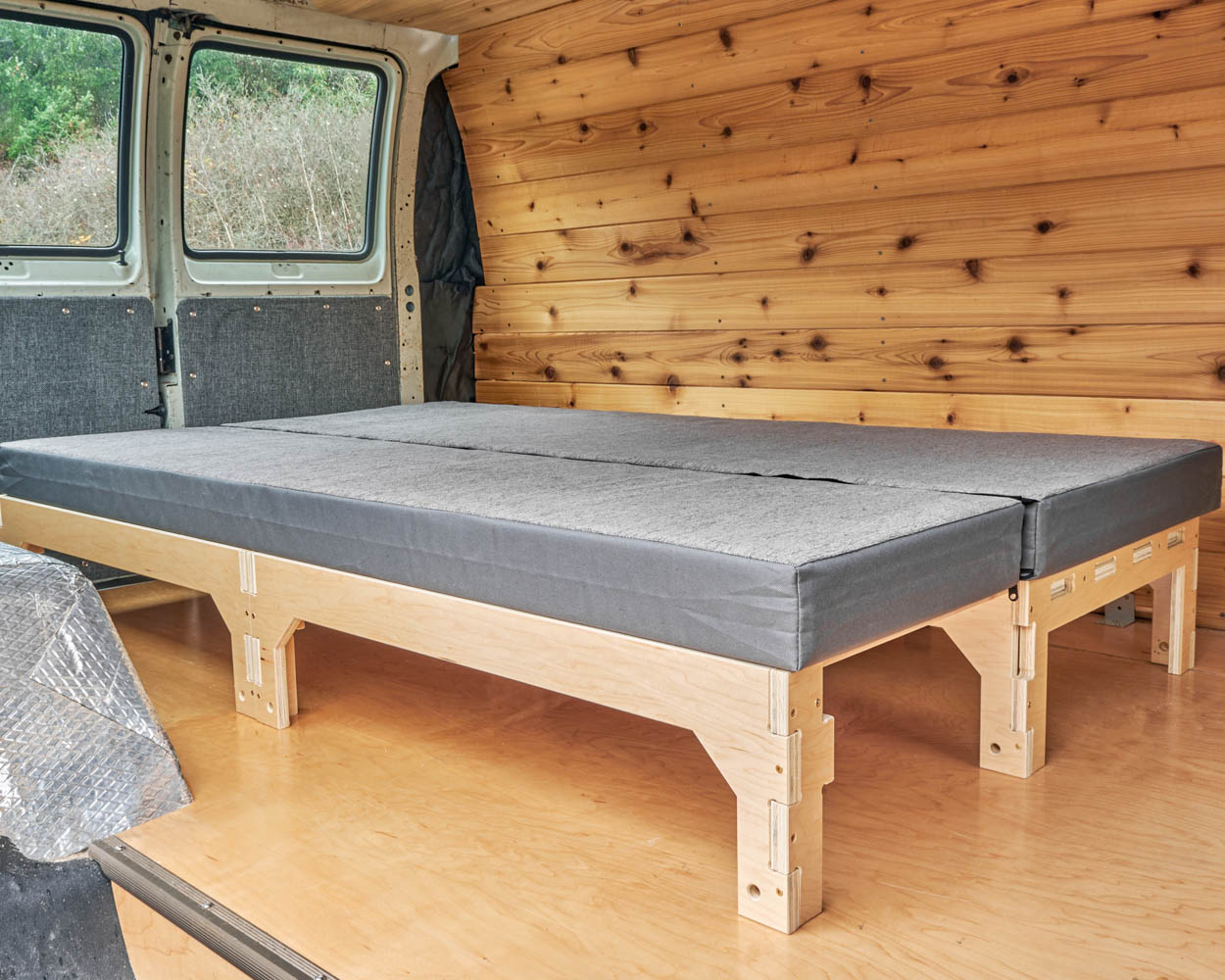 A perfectly fitted custom mattress for use with the Trunk Bunk modular expanding bed platform for cars and vans made by Camp N Car in Washington State in the Pacific Northwest of the United States of America.