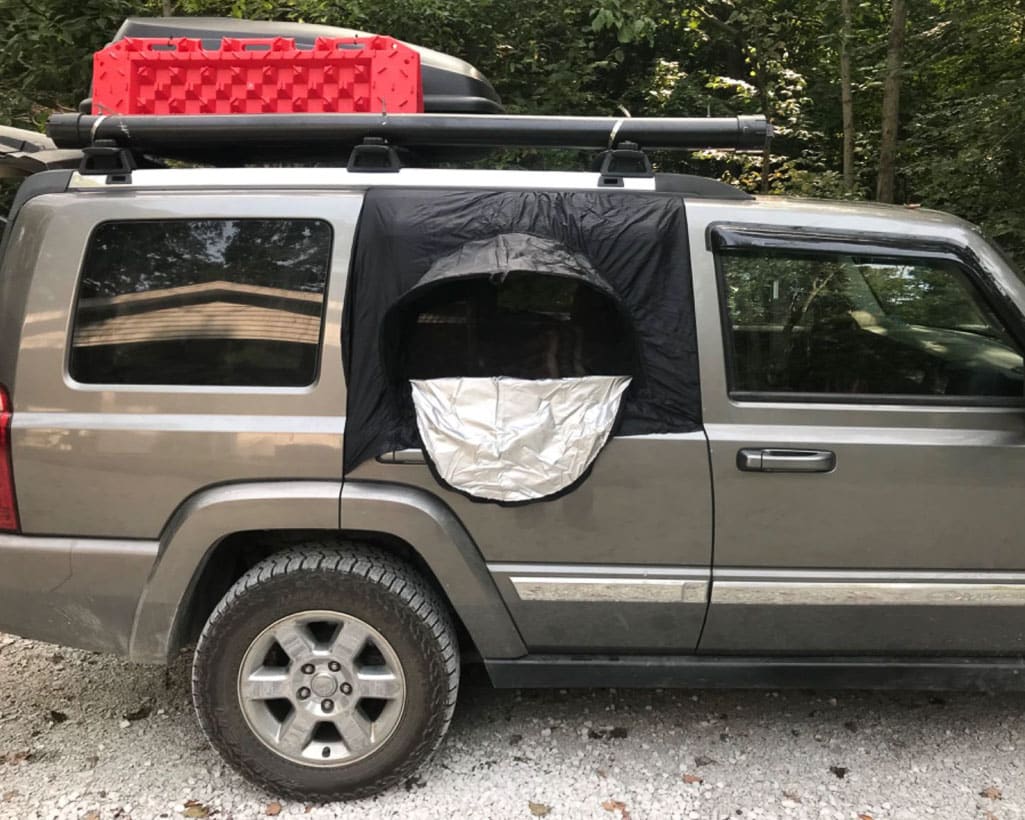 Amazing camper build for comfortable sleeping in a 2017 Toyota RAV4 that stows away in the rear cargo area made by the conversion shop of Camp N Car in Port Townsend Washington.