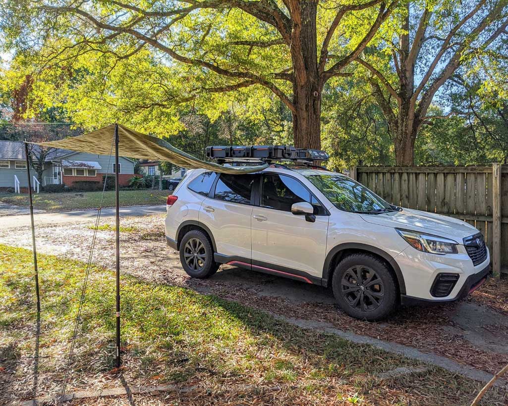 Amazing camper build for comfortable sleeping in a 2017 Toyota RAV4 that stows away in the rear cargo area made by the conversion shop of Camp N Car in Port Townsend Washington.