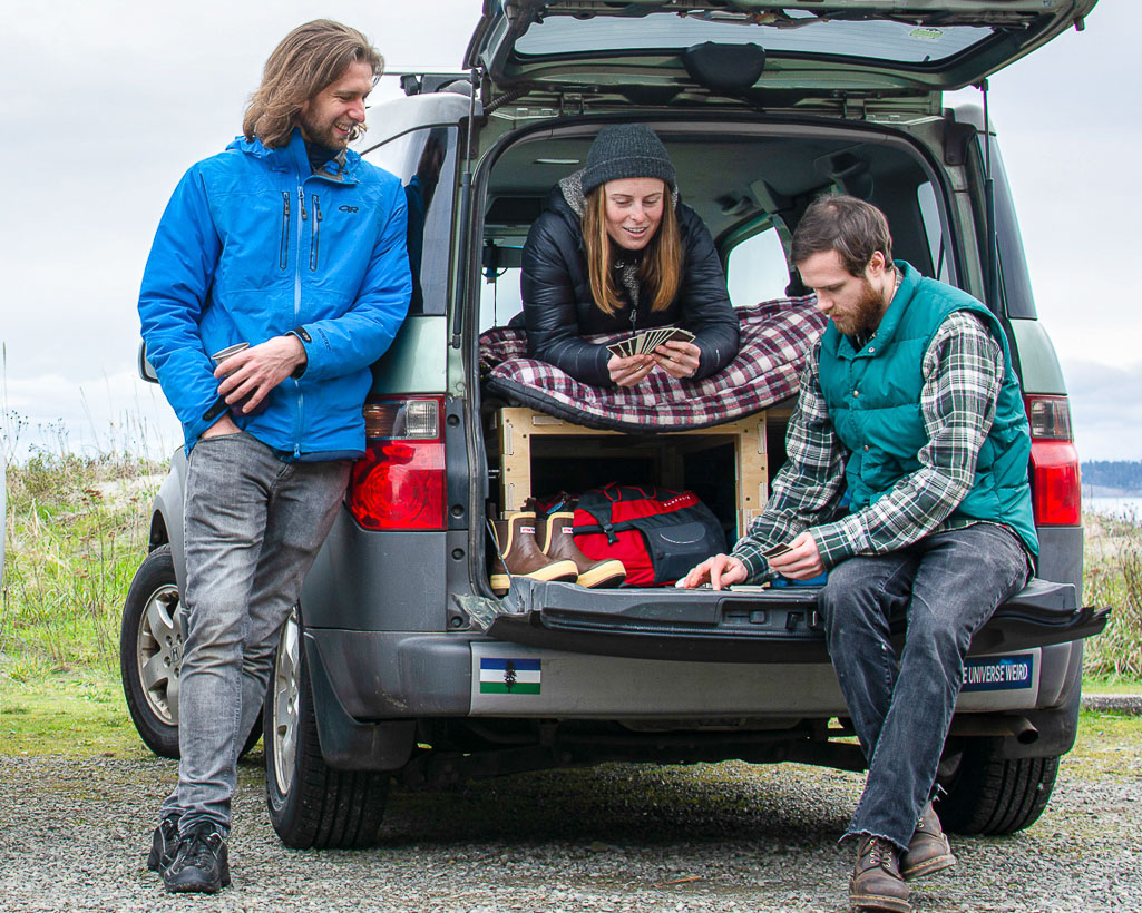 Amazing camper build for comfortable sleeping in a 2017 Toyota RAV4 that stows away in the rear cargo area made by the conversion shop of Camp N Car in Port Townsend Washington.