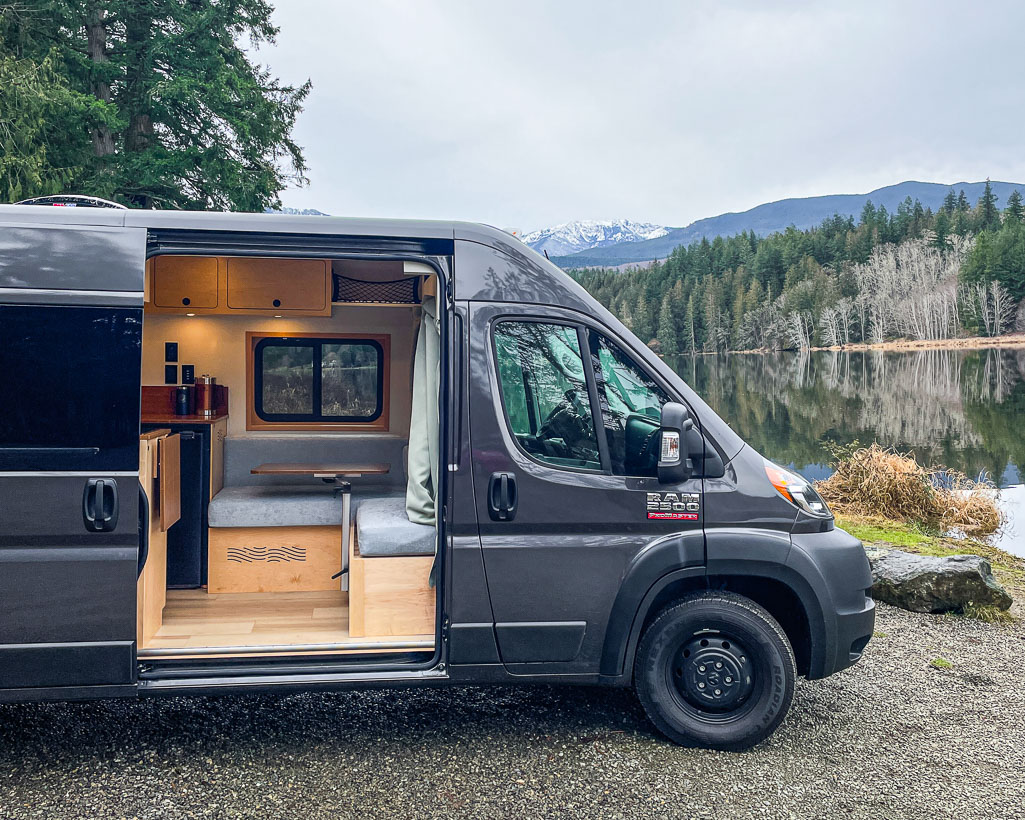 Amazing camper build for comfortable sleeping in a 2017 Toyota RAV4 that stows away in the rear cargo area made by the conversion shop of Camp N Car in Port Townsend Washington.