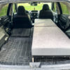 The Pioneer Platform transforms your hatchback or SUV into a cozy camping haven, leveling out your cargo floor for a flat, supportive sleeping surface.